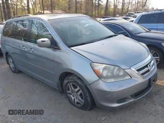 2006 Honda Odyssey EX-L with VIN 5FNRL38736B112674, listed as a IAAI auction lot 41909227 with 223,289 mi miles. Bid and sale history available at carsss.com. Image 1.