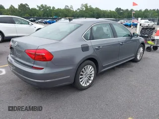 2016 Volkswagen Passat SE z VIN 1VWBT7A36GC007977, wystawiony jako IAAI lot #42433371 z przebiegiem 124 064 mil mil oraz . Historia ofert i sprzedaży dostępna na DreamBid. Obrazek 4.