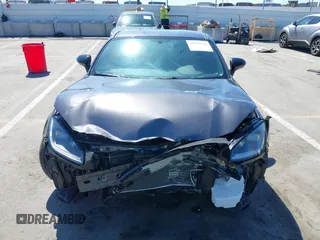 2023 Toyota 86 z VIN JF1ZNBC11P8766474, wystawiony jako IAAI lot #42215516 z przebiegiem 5 708 mil mil oraz . Historia ofert i sprzedaży dostępna na DreamBid. Obrazek 13.