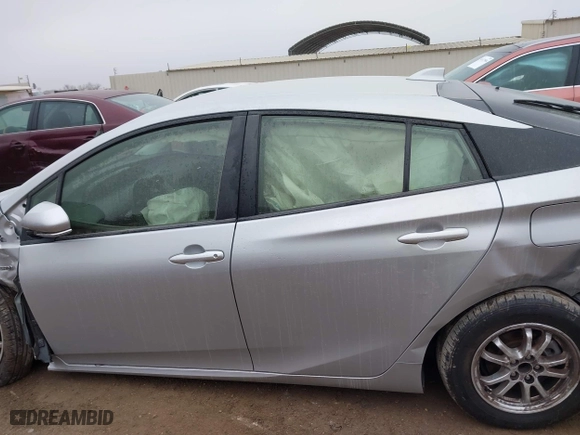 2022 Toyota Prius L Eco with VIN JTDKAMFU9N3185999, listed as a IAAI auction lot 41428106 with 50,798 mi miles. Bid and sale history available at carsss.com. Image 14.