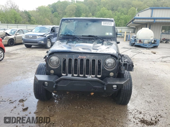 2016 Jeep Wrangler Unlimited 75th Anniversary with VIN 1C4HJWEG3GL198641, listed as a Copart auction lot 55892035 with 128,702 mi miles and Salvage title. Bid and sale history available at DreamBid. Image 5.