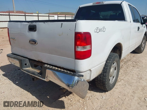 2005 Ford F-150 XLT with VIN 1FTPX14505NA67097, listed as a IAAI auction lot 42012449 with 192,258 mi miles. Bid and sale history available at carsss.com. Image 12.
