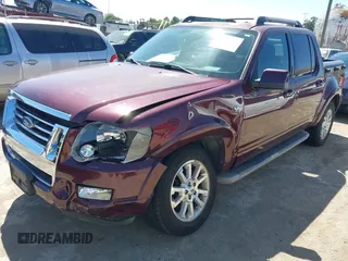 2007 Ford Explorer Sport Trac Limited with VIN 1FMEU33897UA01806, listed as a IAAI auction lot 42272416 with 82,418 mi miles and . Bid and sale history available at DreamBid. Image 2.