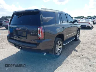 2016 GMC Yukon SLT with VIN 1GKS2BKC2GR277460, listed as a IAAI auction lot 42027026 with 111,191 mi miles. Bid and sale history available at carsss.com. Image 4.