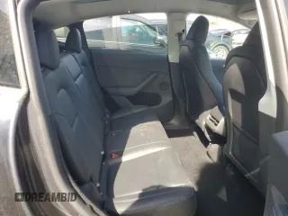 2024 Tesla Model Y Long Range with VIN 7SAYGDEE7RA307013, listed as a Copart auction lot 54767595 with 12,953 mi miles and Salvage Title. Bid and sale history available at DreamBid. Image 11.