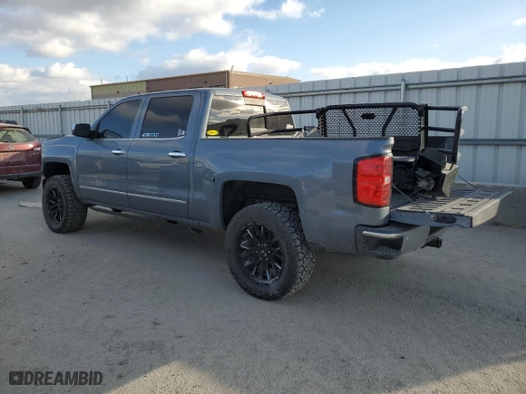 2015 Chevrolet Silverado 1500 LTZ with VIN 3GCUKSEJXFG449988, listed as a Copart auction lot 84434504 with 154,473 mi miles and Salvage Title. Bid and sale history available at carsss.com. Image 2.
