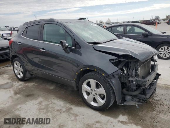 2016 Buick Encore Leather with VIN KL4CJCSB3GB733582, listed as a Copart auction lot 47000905 with 89,657 mi miles and Salvage Title. Bid and sale history available at DreamBid. Image 4.