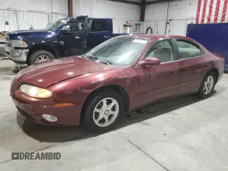 2001 Oldsmobile Aurora z VIN 1G3GR64H514111967, wystawiony jako Copart lot #88178975 z przebiegiem 175 728 mil mil oraz Tytuł czysty. Historia ofert i sprzedaży dostępna na DreamBid. Obrazek 1.