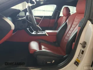 2023 BMW 8 Series 840i with VIN WBAGV4C00PCL13414, listed as a Copart auction lot 51512755 with 23,133 mi miles and Salvage title. Bid and sale history available at DreamBid. Image 7.