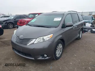 2016 Toyota Sienna XLE with VIN 5TDYK3DC8GS704330, listed as a IAAI auction lot 41586880 with 84,065 mi miles. Bid and sale history available at carsss.com. Image 2.