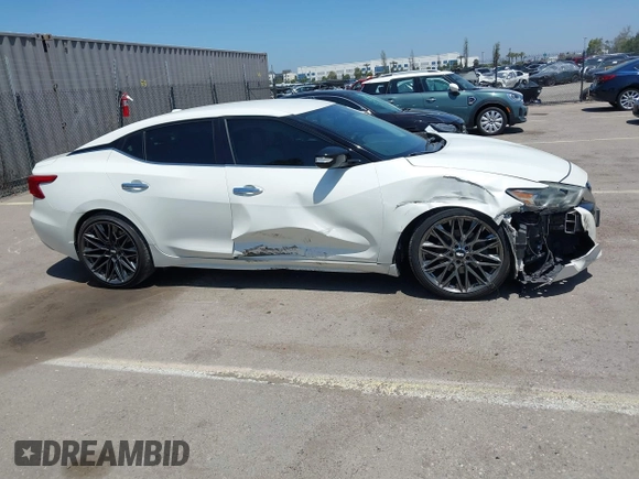 2016 Nissan Maxima SV with VIN 1N4AA6AP6GC903638, listed as a IAAI auction lot 42180421 with 124,586 mi miles and . Bid and sale history available at DreamBid. Image 13.