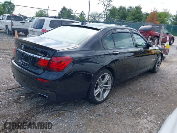 2013 BMW 7 Series 750Li z VIN WBAYE8C59DD133605, wystawiony jako IAAI lot #42179893 z przebiegiem 73 065 mil mil oraz . Historia ofert i sprzedaży dostępna na DreamBid. Obrazek 4.