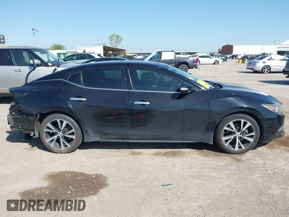 2018 Nissan Maxima SV with VIN 1N4AA6AP4JC390509, listed as a IAAI auction lot 42016247 with 67,345 mi miles and . Bid and sale history available at DreamBid. Image 14.
