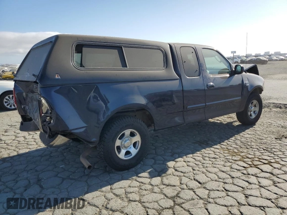 2003 Ford F-150 XL z VIN 2FTRX17W63CA80033, wystawiony jako Copart lot #58432895 z przebiegiem 111 133 mil mil oraz Szkoda całkowita • Salvage title. Historia ofert i sprzedaży dostępna na DreamBid. Obrazek 3.