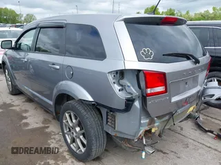 2015 Dodge Journey R/T with VIN 3C4PDCEG0FT679063, listed as a IAAI auction lot 42251861 with 138,258 mi miles and . Bid and sale history available at DreamBid. Image 3.