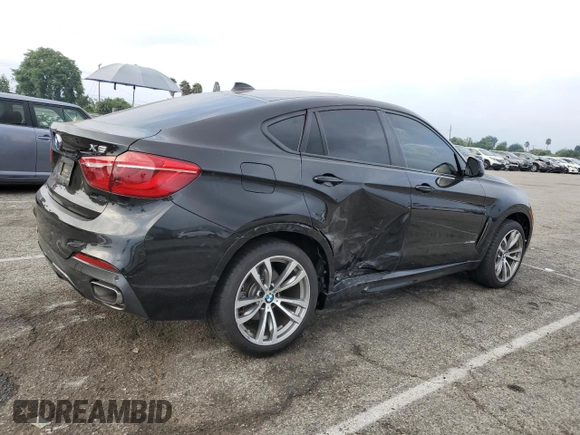 2016 BMW X6 xDrive50i with VIN 5UXKU6C50G0R34210, listed as a Copart auction lot 69003723 with 33,134 mi miles. Bid and sale history available at carsss.com. Image 3.
