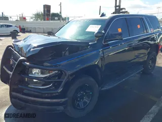 2018 Chevrolet Tahoe Commercial with VIN 1GNLCDECXJR298690, listed as a IAAI auction lot 41367931 with 1 mi miles. Bid and sale history available at carsss.com. Image 2.