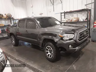 2021 Toyota Tacoma SR z VIN 3TMCZ5ANXMM447867, wystawiony jako IAAI lot #41955965 z przebiegiem 36 581 mil mil oraz . Historia ofert i sprzedaży dostępna na DreamBid. Obrazek 1.