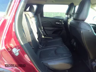 2014 Jeep Cherokee Limited with VIN 1C4PJMDB7EW165272, listed as a IAAI auction lot 35106260 with 102,934 mi miles and . Bid and sale history available at DreamBid. Image 8.