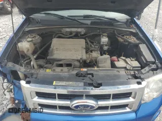 2011 Ford Escape XLT z VIN 1FMCU9DG4BKB20979, wystawiony jako Copart lot #64101215 z przebiegiem 213 244 mil mil oraz Szkoda całkowita • Salvage title. Historia ofert i sprzedaży dostępna na DreamBid. Obrazek 12.