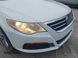 2011 Volkswagen CC Sport z VIN WVWMN7AN2BE711744, wystawiony jako IAAI lot #42416773 z przebiegiem 142 029 mil mil oraz . Historia ofert i sprzedaży dostępna na DreamBid. Obrazek 14.