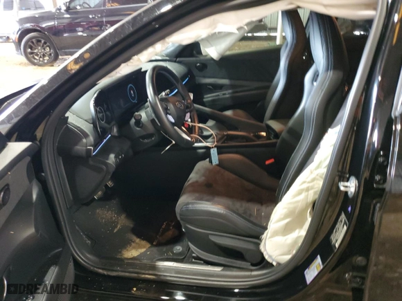 2023 Hyundai Elantra N with VIN KMHLW4AK9PU016683, listed as a Copart auction lot 85238464 with 7,835 mi miles and Salvage Title. Bid and sale history available at carsss.com. Image 7.