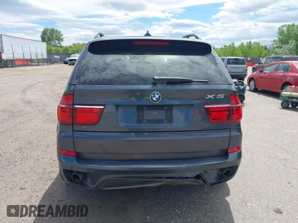 2012 BMW X5 35i z VIN 5UXZV4C53CL987556, wystawiony jako IAAI lot #42297756 z przebiegiem 190 922 mil mil oraz . Historia ofert i sprzedaży dostępna na DreamBid. Obrazek 16.
