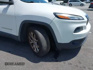 2016 Jeep Cherokee Latitude with VIN 1C4PJLCB0GW291357, listed as a IAAI auction lot 42312356 with 105,692 mi miles and . Bid and sale history available at DreamBid. Image 18.