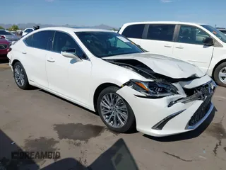 2021 Lexus ES 300h with VIN 58ADA1C13MU009089, listed as a IAAI auction lot 42674472 with 31,924 mi miles and . Bid and sale history available at DreamBid. Image 1.