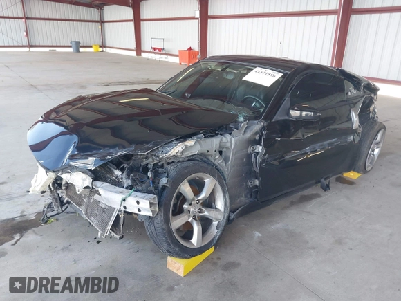 2008 Nissan 350Z z VIN JN1BZ34D98M705867, wystawiony jako IAAI lot #41871586 z przebiegiem 90 717 mil mil oraz . Historia ofert i sprzedaży dostępna na DreamBid. Obrazek 17.