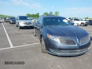 2013 Lincoln MKS with VIN 1LNHL9DK3DG616018, listed as a IAAI auction lot 42820475 with 156,177 mi miles and . Bid and sale history available at DreamBid. Image 1.