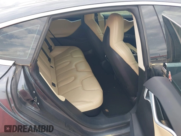 2016 Tesla Model S 90D with VIN 5YJSA1E27GF129130, listed as a IAAI auction lot 41922227 with 134,422 mi miles and . Bid and sale history available at DreamBid. Image 8.