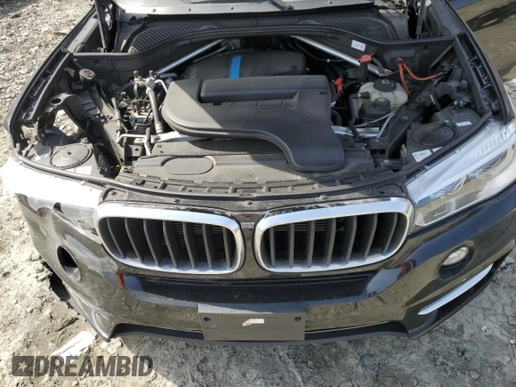 2016 BMW X5 xDrive40e z VIN 5UXKT0C59G0S77407, wystawiony jako Copart lot #50094255 z przebiegiem 93 264 mil mil oraz Szkoda całkowita • Salvage title. Historia ofert i sprzedaży dostępna na DreamBid. Obrazek 13.