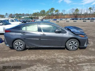 2018 Toyota Prius Prime Plus with VIN JTDKARFP3J3096141, listed as a IAAI auction lot 41822905 with 61,159 mi miles. Bid and sale history available at carsss.com. Image 12.