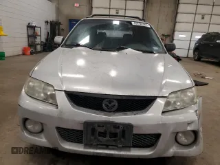 2002 Mazda Protege z VIN JM1BJ245X21565456, wystawiony jako Copart lot #43756385 z przebiegiem 195 892 mil mil oraz Szkoda całkowita • Salvage title. Historia ofert i sprzedaży dostępna na DreamBid. Obrazek 5.