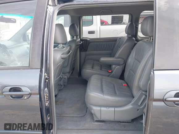 2003 Honda Odyssey EX-L with VIN 5FNRL18903B090800, listed as a IAAI auction lot 41843858 with 201,393 mi miles and . Bid and sale history available at DreamBid. Image 8.