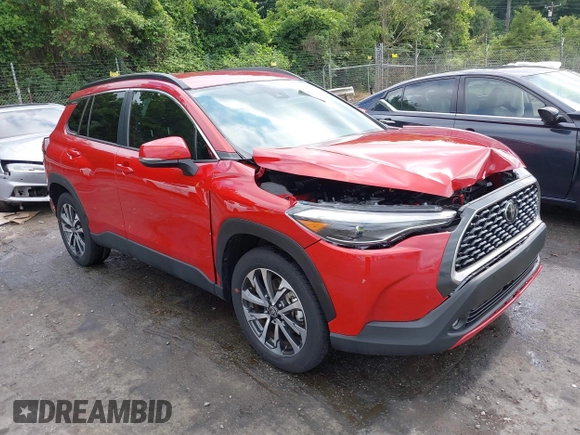 2022 Toyota Corolla Cross XLE z VIN 7MUEAABG0NV030757, wystawiony jako IAAI lot #42597979 z przebiegiem 20 172 mil mil oraz . Historia ofert i sprzedaży dostępna na DreamBid. Obrazek 1.