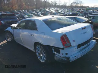 2011 Chrysler 300 with VIN 2C3CA6CT2BH537877, listed as a IAAI auction lot 41405184 with 212,027 mi miles. Bid and sale history available at carsss.com. Image 3.