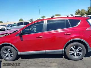 2016 Toyota RAV4 XLE with VIN 2T3WFREV3GW239632, listed as a IAAI auction lot 41860727 with 135,850 mi miles. Bid and sale history available at carsss.com. Image 14.