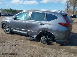 2021 Honda CR-V Touring with VIN 2HKRW2H9XMH645901, listed as a IAAI auction lot 41870446 with 22,996 mi miles. Bid and sale history available at carsss.com. Image 3.