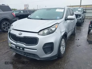 2018 Kia Sportage LX with VIN KNDPM3AC7J7337951, listed as a IAAI auction lot 41900482 with 105,857 mi miles and . Bid and sale history available at carsss.com. Image 2.