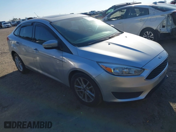 2015 Ford Focus SE with VIN 1FADP3F20FL355058, listed as a IAAI auction lot 41666337 with 144,887 mi miles. Bid and sale history available at carsss.com. Image 1.