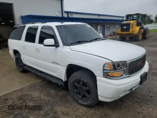 2003 GMC Yukon XL with VIN 1GKFK66U83J313981, listed as a Copart auction lot 65121004 with 301,229 mi miles and Clean Title. Bid and sale history available at carsss.com. Image 4.