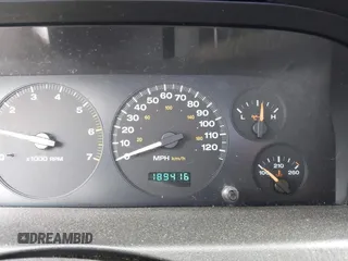 2004 Jeep Grand Cherokee Laredo z VIN 1J4GW48S54C198115, wystawiony jako IAAI lot #42351240 z przebiegiem 189 416 mil mil oraz . Historia ofert i sprzedaży dostępna na DreamBid. Obrazek 16.