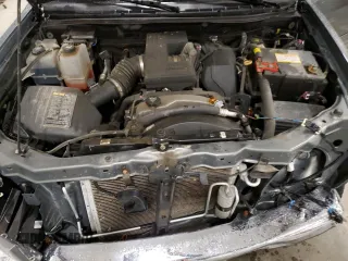 2010 GMC Canyon SLE1 with VIN 1GTJTCDE5A8148716, listed as a Copart auction lot 57559215 with 126,523 mi miles and Salvage title. Bid and sale history available at DreamBid. Image 11.