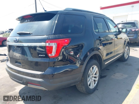 2019 Ford Explorer XLT z VIN 1FM5K8D81KGB26100, wystawiony jako IAAI lot #42074775 z przebiegiem 91 944 mil mil oraz . Historia ofert i sprzedaży dostępna na DreamBid. Obrazek 4.