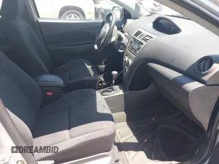 2009 Toyota Yaris z VIN JTDBT903591344784, wystawiony jako IAAI lot #42402332 z przebiegiem 173 865 mil mil oraz . Historia ofert i sprzedaży dostępna na DreamBid. Obrazek 5.