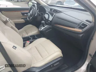 2018 Honda CR-V Touring with VIN 5J6RW2H96JL000910, listed as a IAAI auction lot 42490580 with 201,534 mi miles and . Bid and sale history available at DreamBid. Image 5.