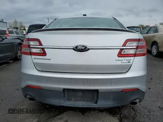 2013 Ford Taurus Limited z VIN 1FAHP2J89DG141683, wystawiony jako Copart lot #52462575 z przebiegiem 77 235 mil mil oraz Czysty tytuł • Clean title. Historia ofert i sprzedaży dostępna na DreamBid. Obrazek 6.