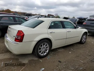 2009 Chrysler 300 Limited with VIN 2C3KA33V39H590917, listed as a Copart auction lot 77657054 with 180,613 mi miles and Clean Title. Bid and sale history available at carsss.com. Image 3.